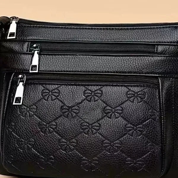Butterfly black women's crossbody messenger bag with embossing details and mobile phone compartment
