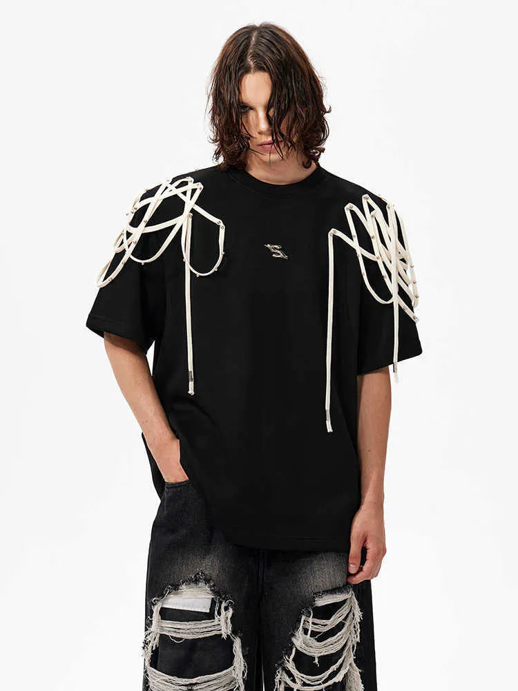 Black short-sleeved t-shirt with padded shoulders and rivet ribbon detail in loose fit round neck style