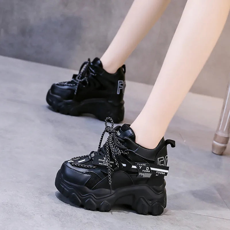 Women's white mesh platform sports shoes with a cross-strap design and rubber sole