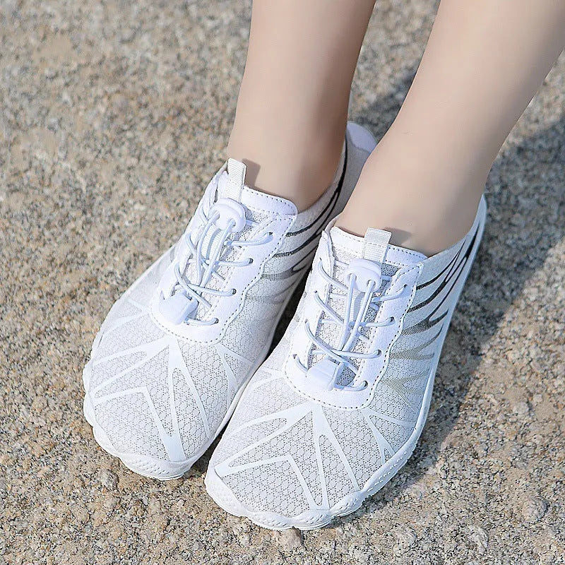 Men and women's low-top lace-up running shoes in various colours with breathable upper and rubber sole.