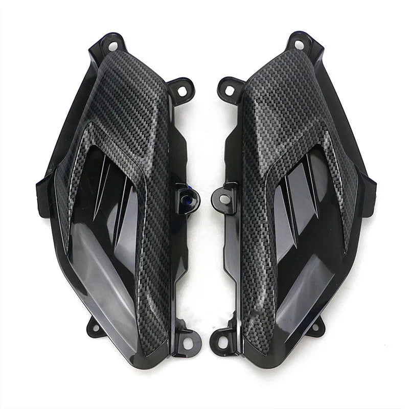 Yamaha NMAX LED side lamp replacement kit with carbon fibre decoration showing ABS plastic construction