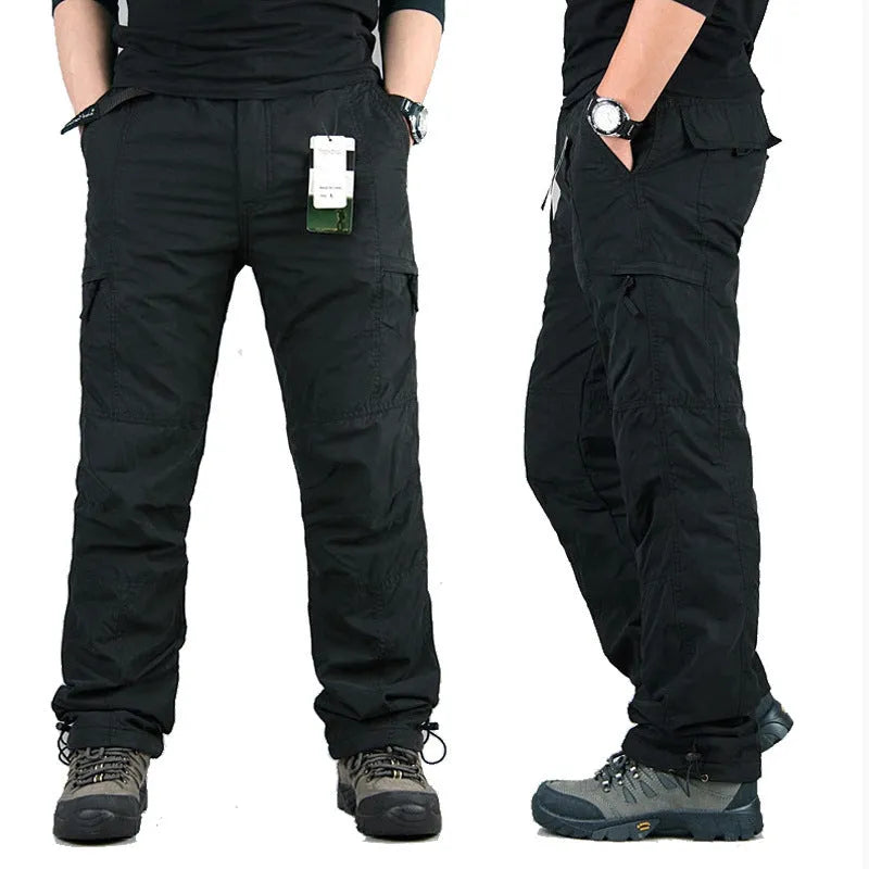 Men's khaki cotton overalls with a wool lining, showing loose fit and straight leg design.
