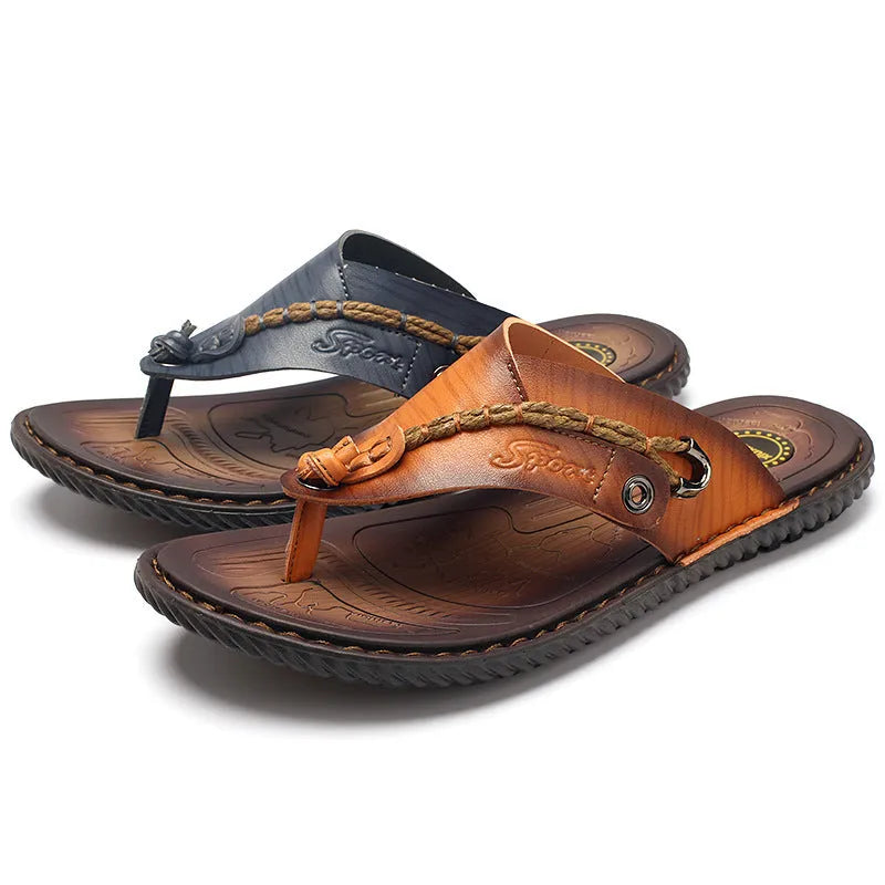 Men's dark blue herringbone-patterned outdoor slippers with a leather lining and rubber sole, shown in a large size.