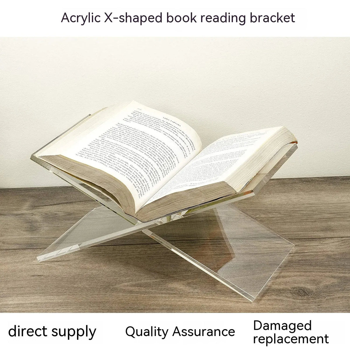Transparent acrylic X-shaped book display rack holding books upright on desktop