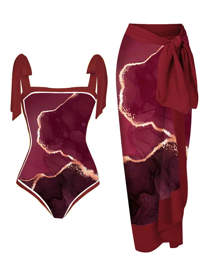 Women's printed floral chiffon two-piece swimsuit with a matching hip skirt.