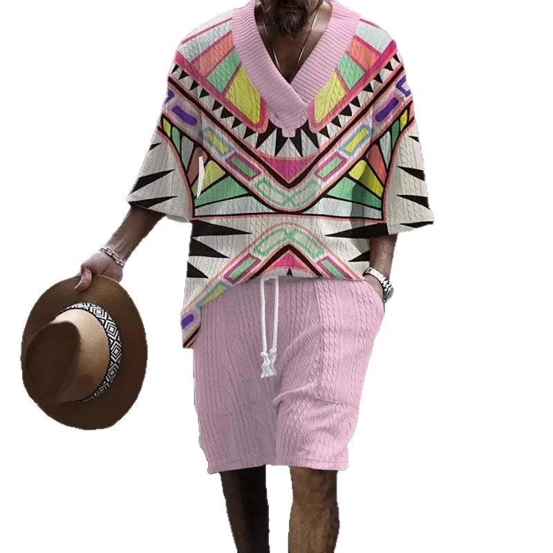 Man wearing a loose casual short sleeve suit top and matching shorts in a solid colour