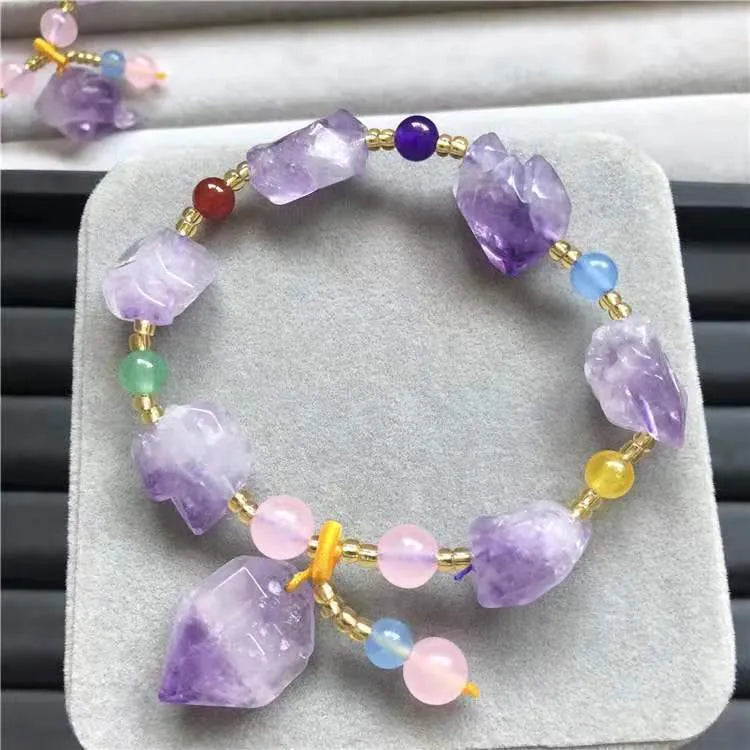 Purple amethyst bracelet with natural-shaped beads and fu character element detail