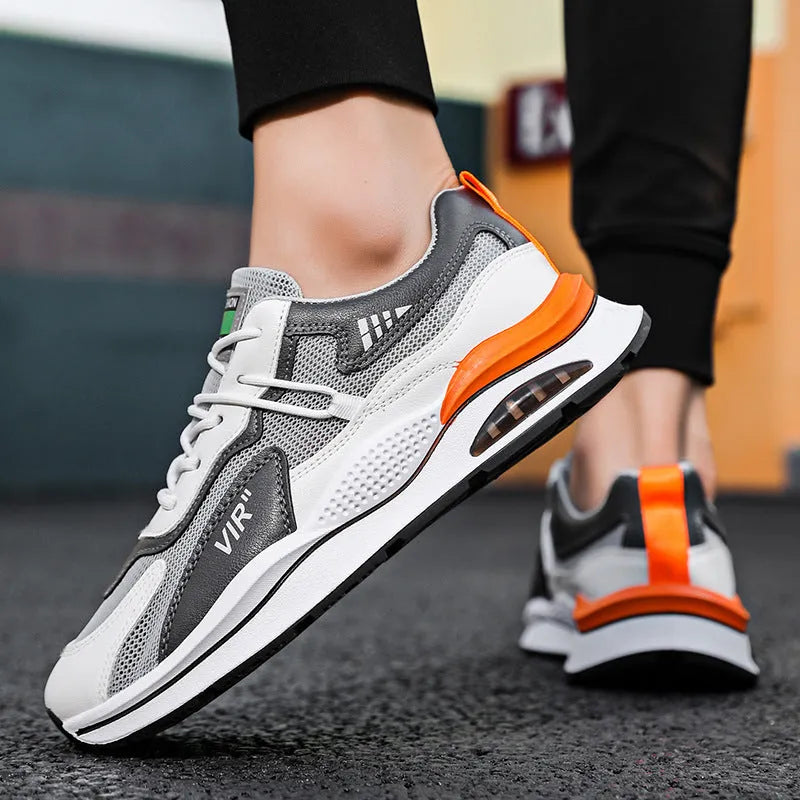 Men's grey mesh casual shoes with round toe and mid-top height design