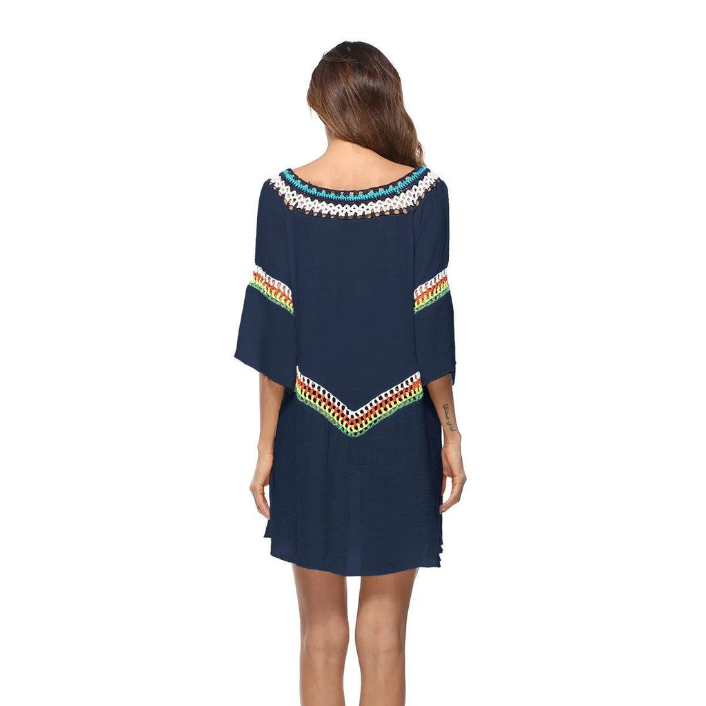 Crocheted ethnic style women's beach cover-up in acrylic fabric for sun protection.
