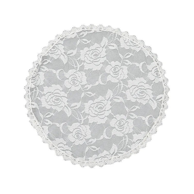 Round black and white floral wedding veil head accessory measuring 30cm.