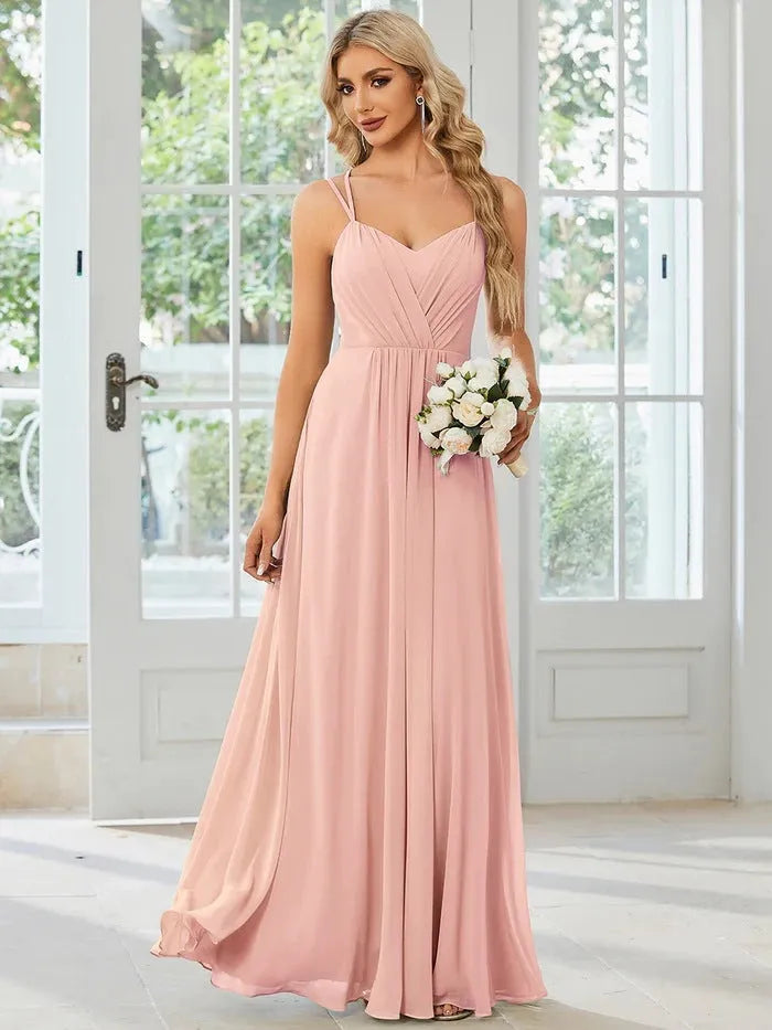 Women's long pleated A-line dress in polyester fabric, sleeveless design available in multiple colours