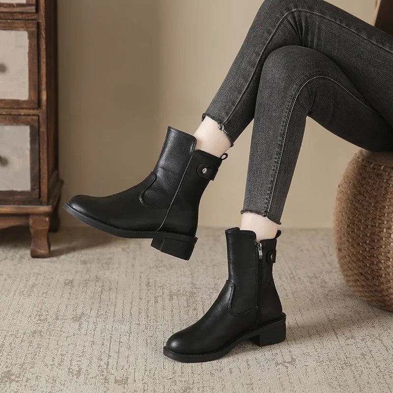 Black women's low heel ankle boots with side zip and round toe