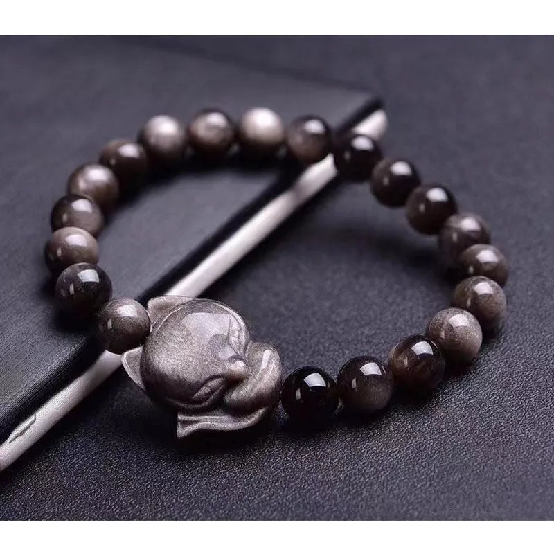 Obsidian fox single ring bracelet showing polished 8mm stone bead with detailed fox pendant on adjustable band