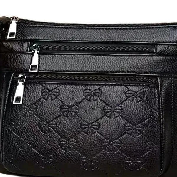 Butterfly black women's crossbody messenger bag with embossing details and mobile phone compartment