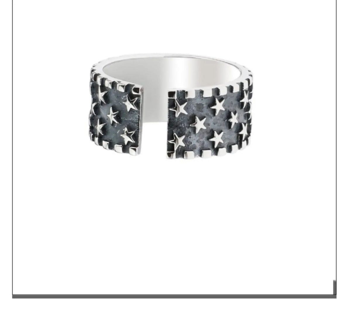 Silver ring with multiple five-pointed star geometric pattern on an adjustable band.