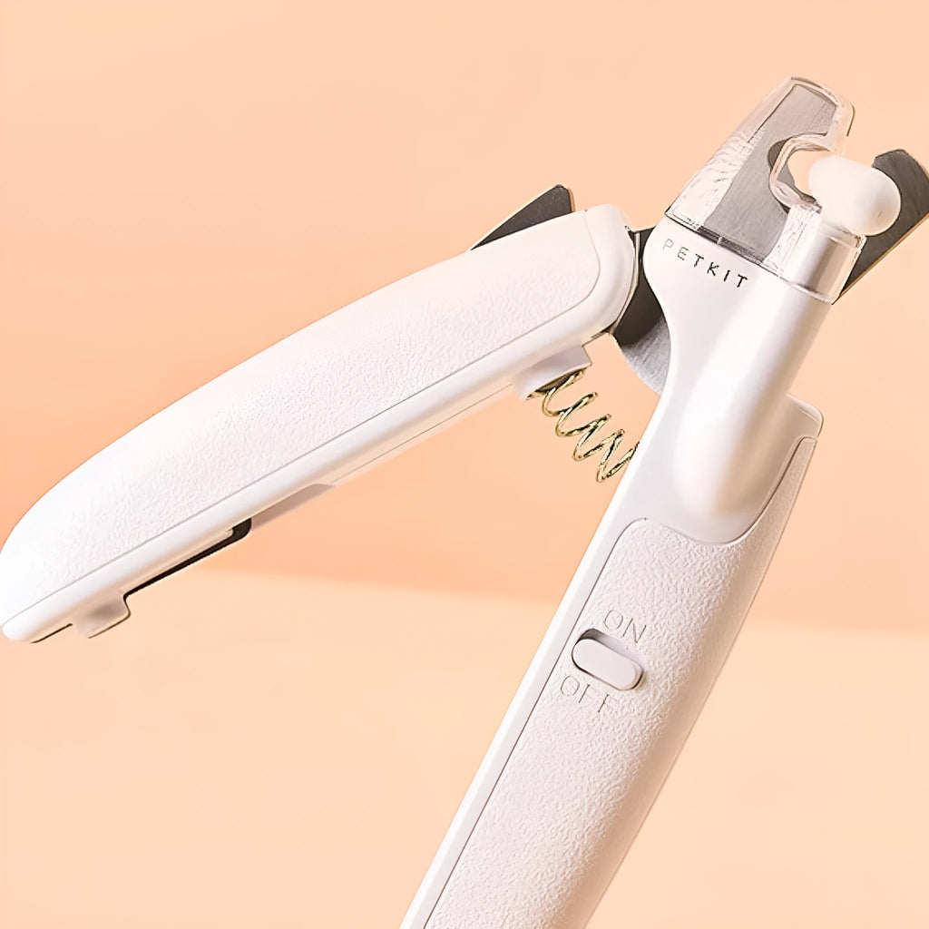 White LED pet nail clippers with transparent anti-splash guard open to show triangular stainless steel blades