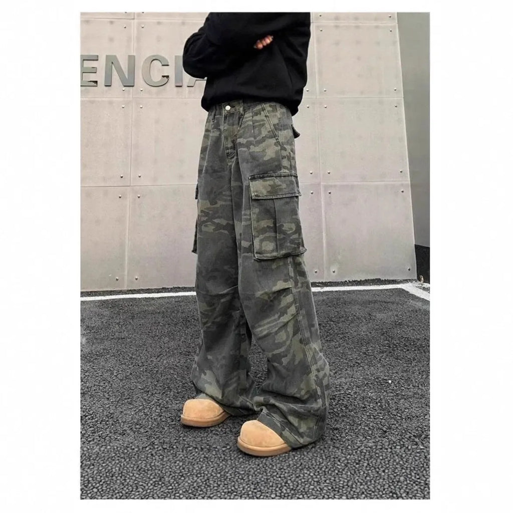 Washed camouflage cotton blend cargo trousers with multiple pockets on a mid-rise waist.