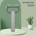 Green dog grooming comb with stainless steel teeth for removing knots from pet hair