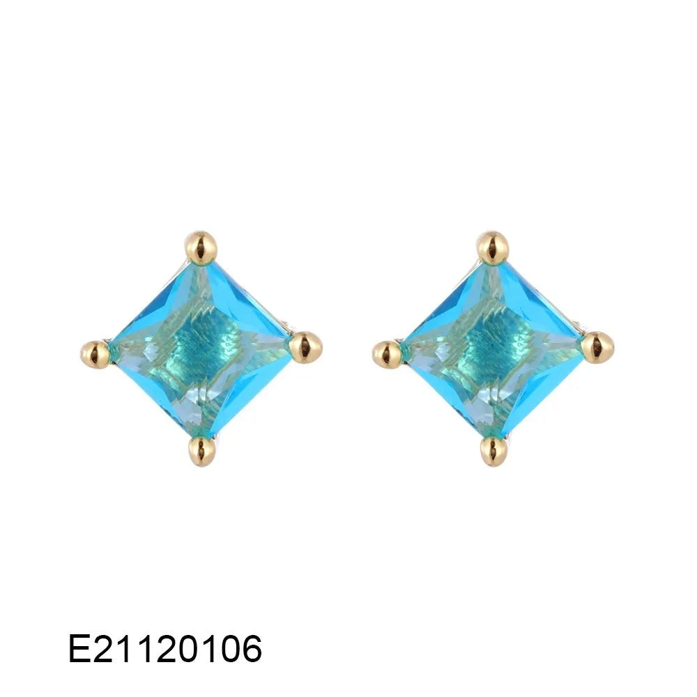 Gold-plated drop earring with a pear-shaped candy-coloured zircon stone on a copper setting.