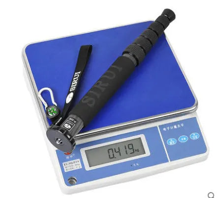 Black carbon fibre SLR camera monopod with six telescopic sections extended