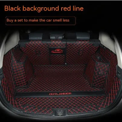 Tailored TPE XPE boot liner fitted in a Mitsubishi Outlander, showing full coverage and raised 3D edges.