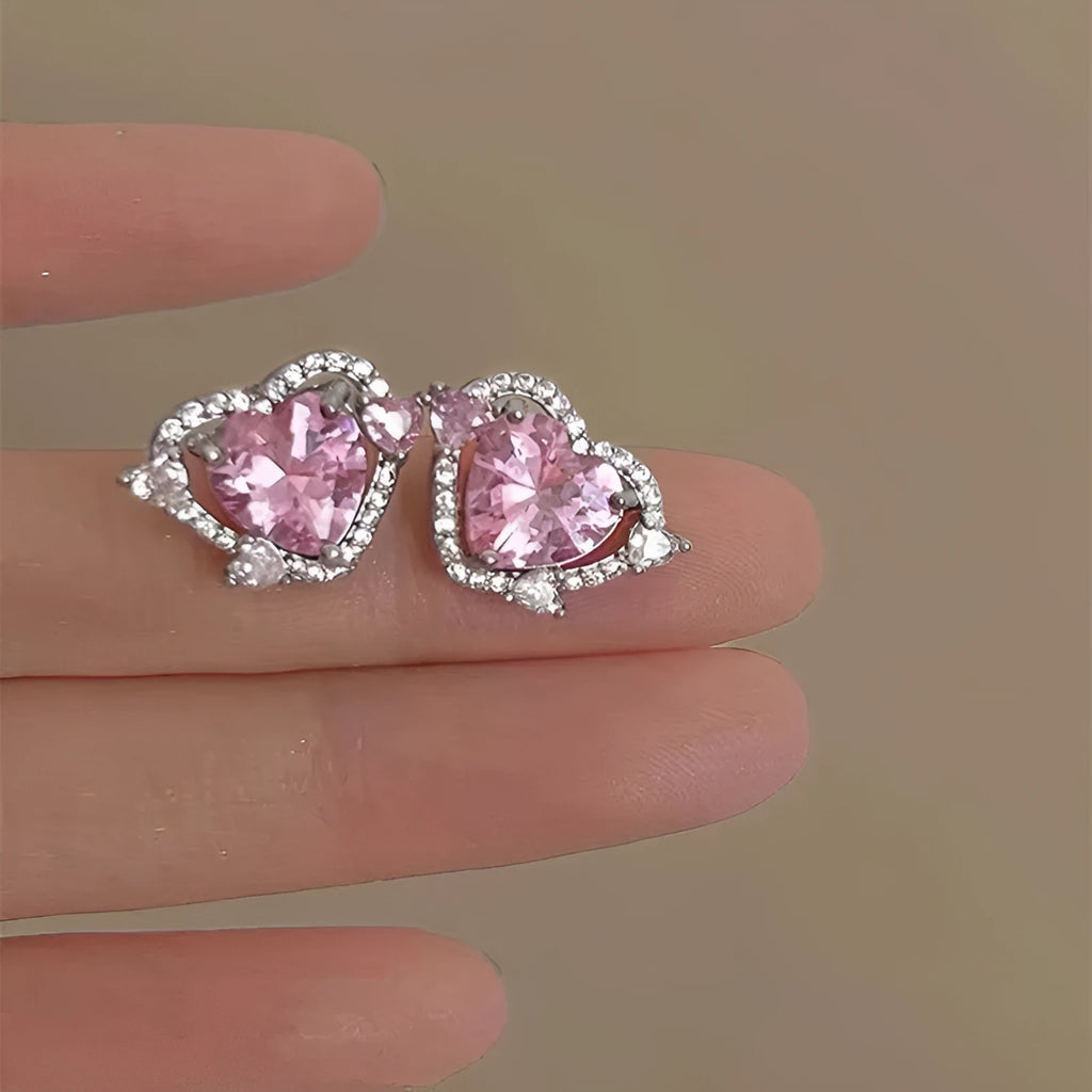 Women's heart-shaped stud earrings with white K electroplated finish on copper