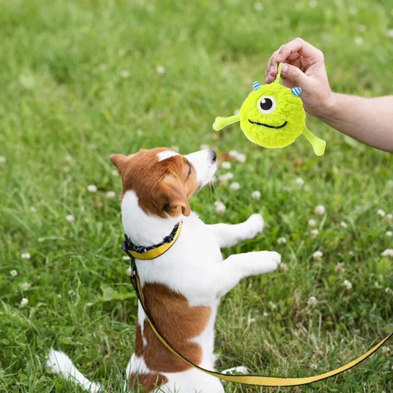 Green interactive dog teething ball toy with sound activation feature for chewing play