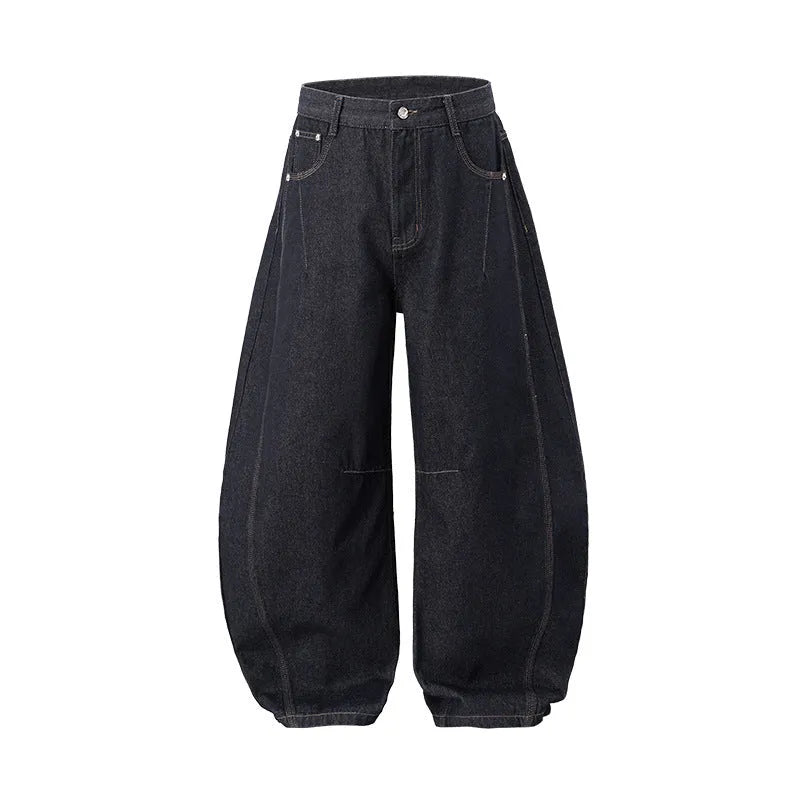 Men's original cow colour wide leg denim trousers on a mid-waist model.