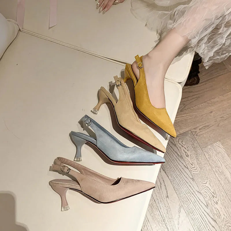 Women's suede stiletto high heels with pointed toe in apricot colour on a light background.