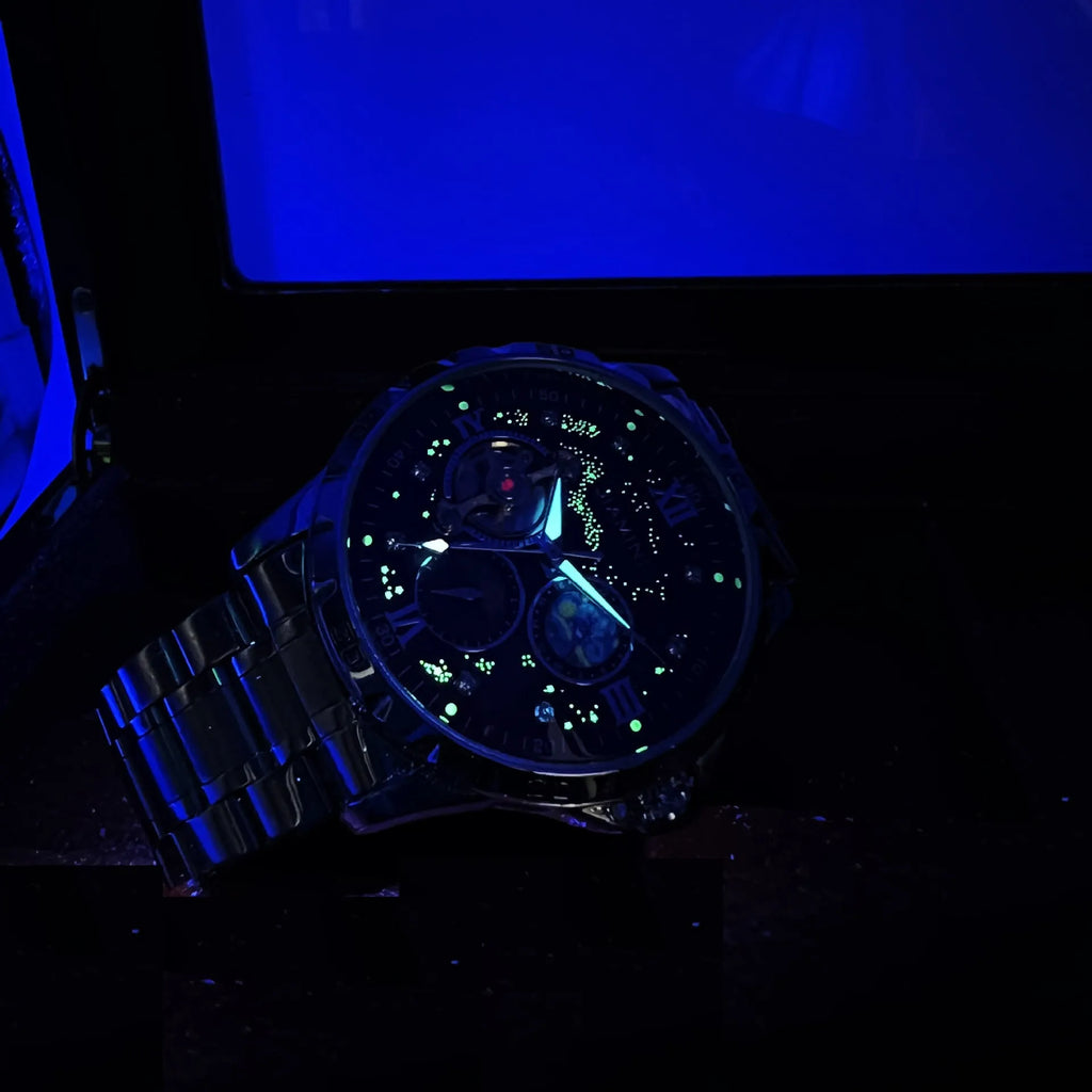 Automatic mechanical men's watch with rose gold shell and black dial showing large multifunctional display