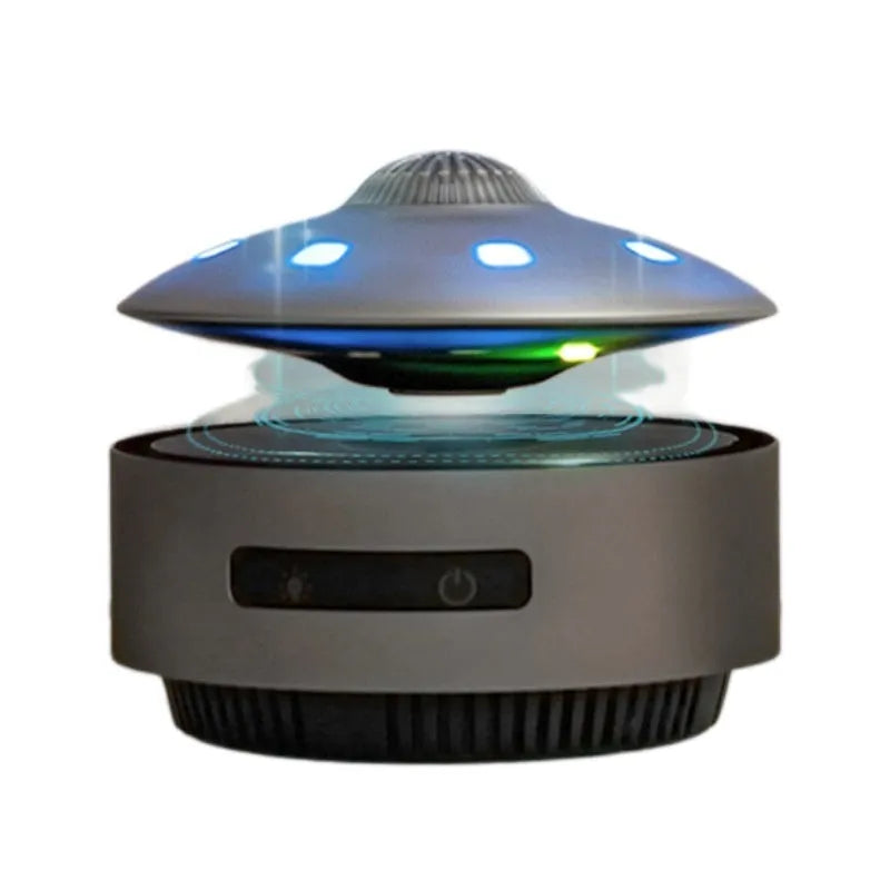 Magnetic levitation Bluetooth speaker hovering above its base in automatic lifting audio colour.