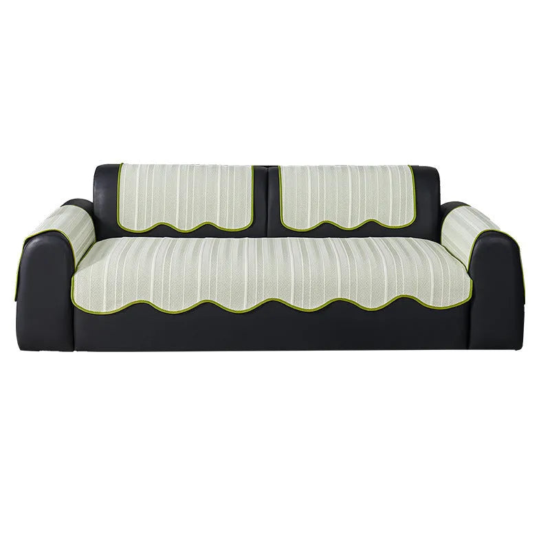 Special-shaped straight row patterned sofa cover in ice silk fabric on a grey sofa