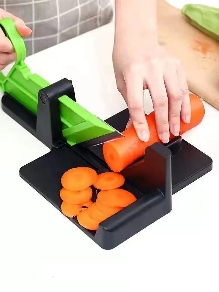 Green vegetable cutter with stainless steel blades for cutting carrots and potatoes