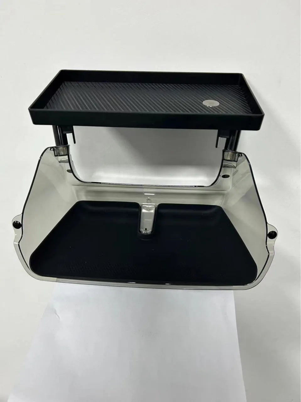 Black ABS plastic storage box for under the Tesla Model 3 and Y centre console screen.