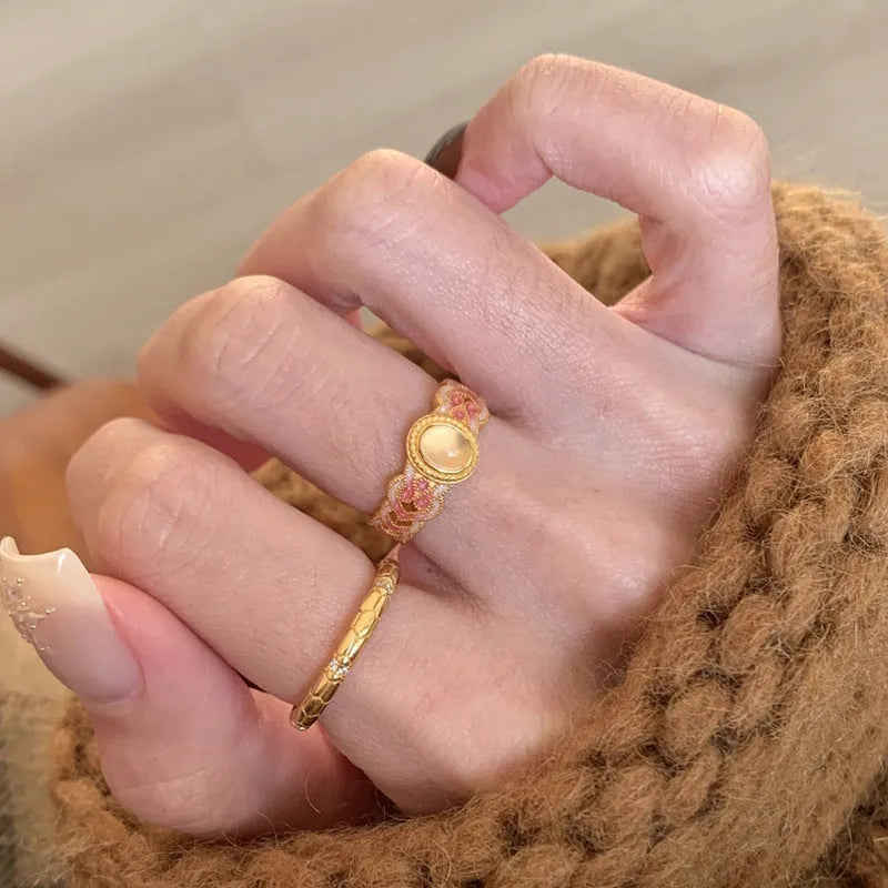 Pink crystal enamel geometric open mouth ring for women with gold plating.
