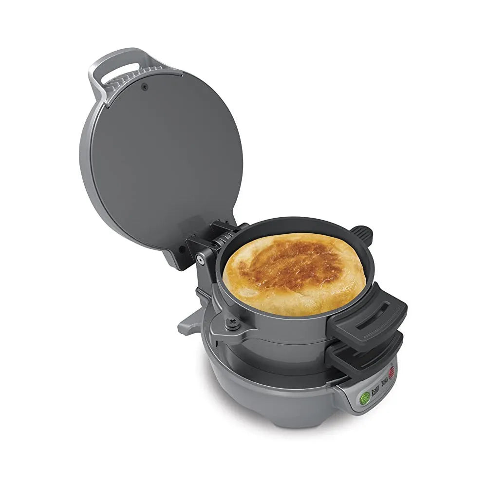 Bright red household breakfast machine with sandwich plates, egg cooker ring, and waffle plates on kitchen counter.