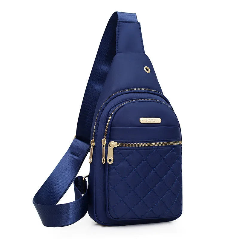 Oxford cloth crossbody chest bag for girls in assorted colours on an adjustable strap.