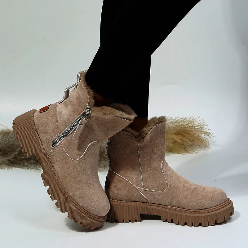 Women's black faux suede high-top snow boots with side zip and non-slip rubber sole.