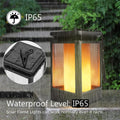 Antique-style grey solar-powered garden street lamp with LED lights in a daytime setting.