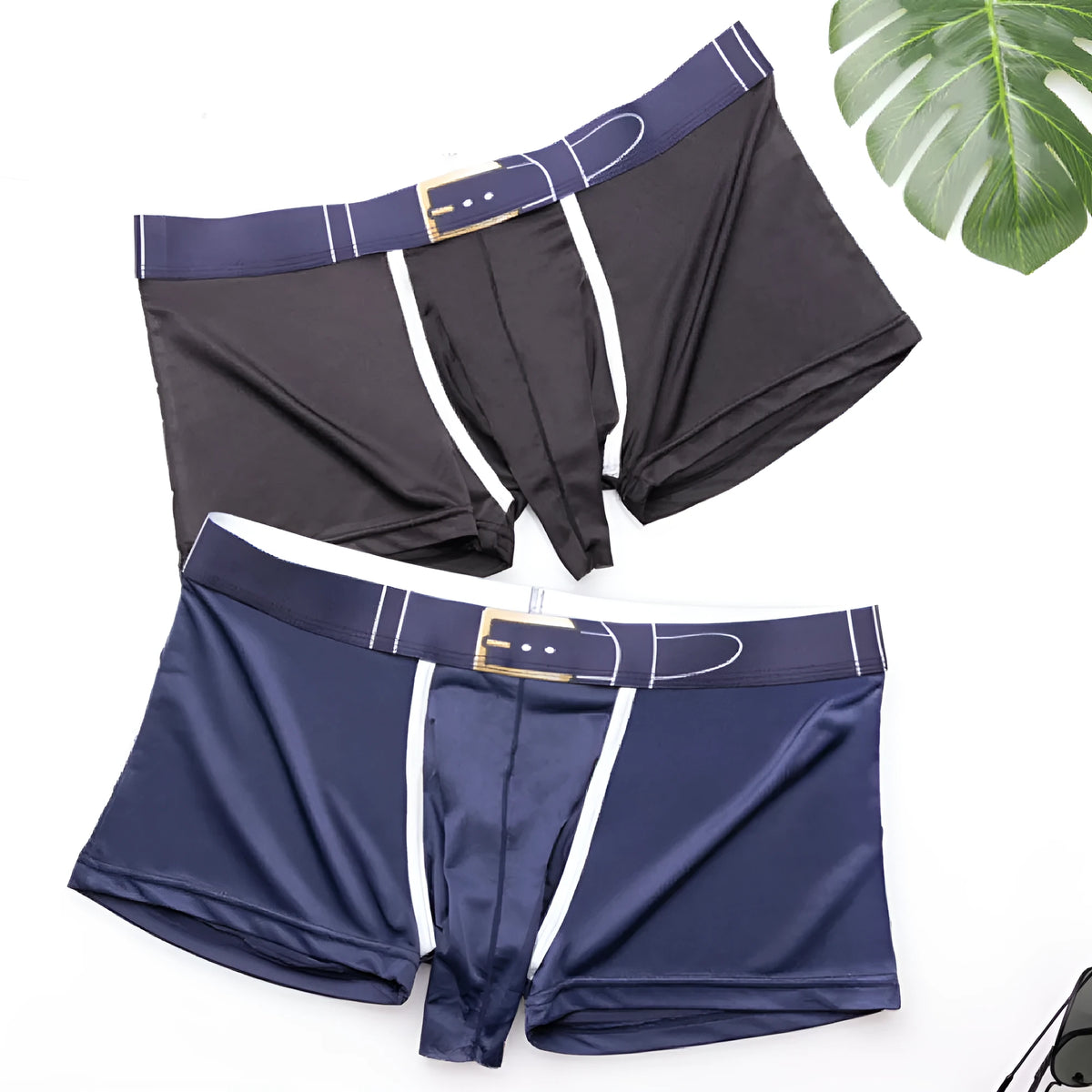 Men's grey ice silk boxer briefs laid flat, showing mid-waist design and solid colour.