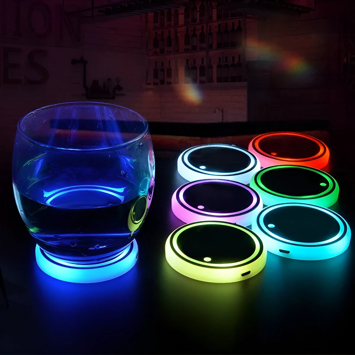 Colourful LED light-up coaster for car cup holder showing seven light modes on a non-slip acrylic surface.
