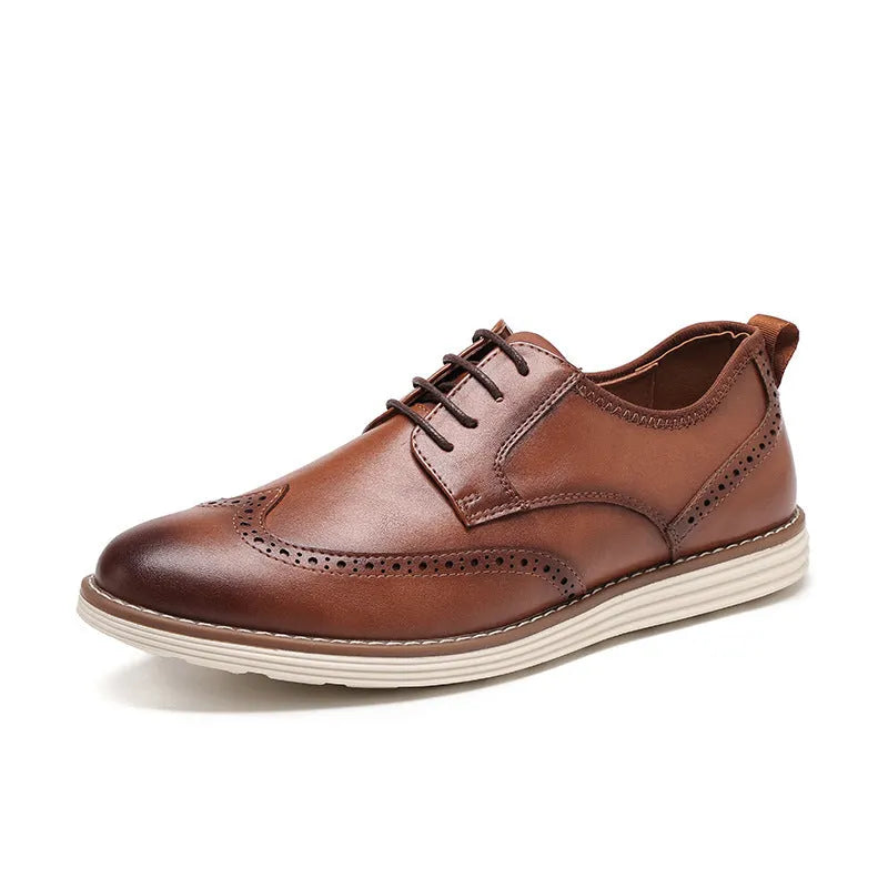 Men's black slip-on business casual shoes with round toe and carved detail on a PU upper.