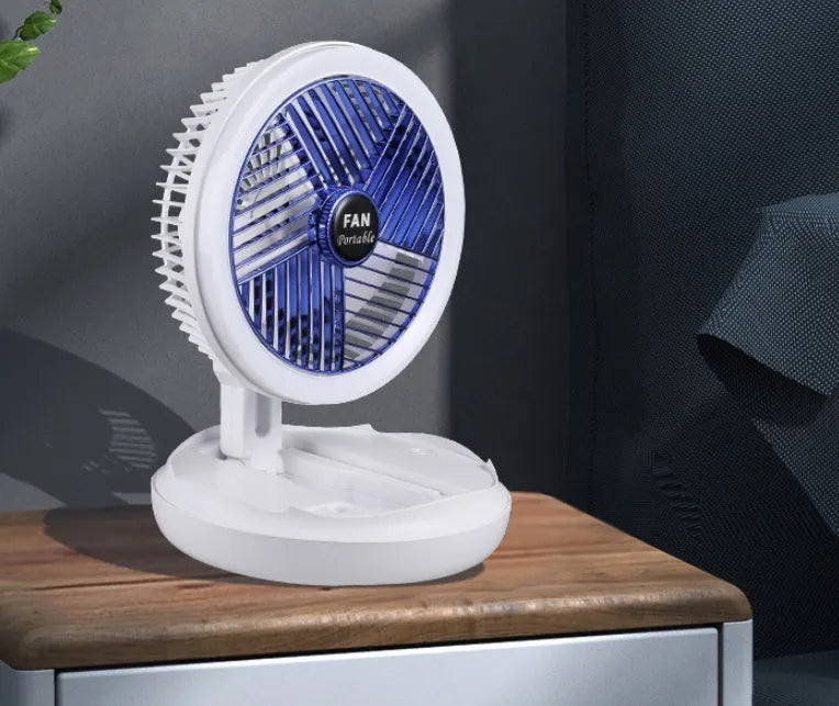 Blue foldable table fan with LED light showing 300° rotation angle and pen holder design