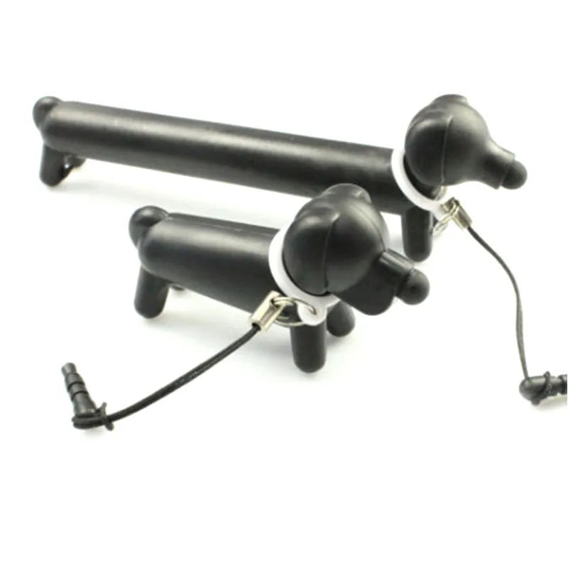 Black dog shaped touch screen stylus showing adjustable length design and phone stand conversion