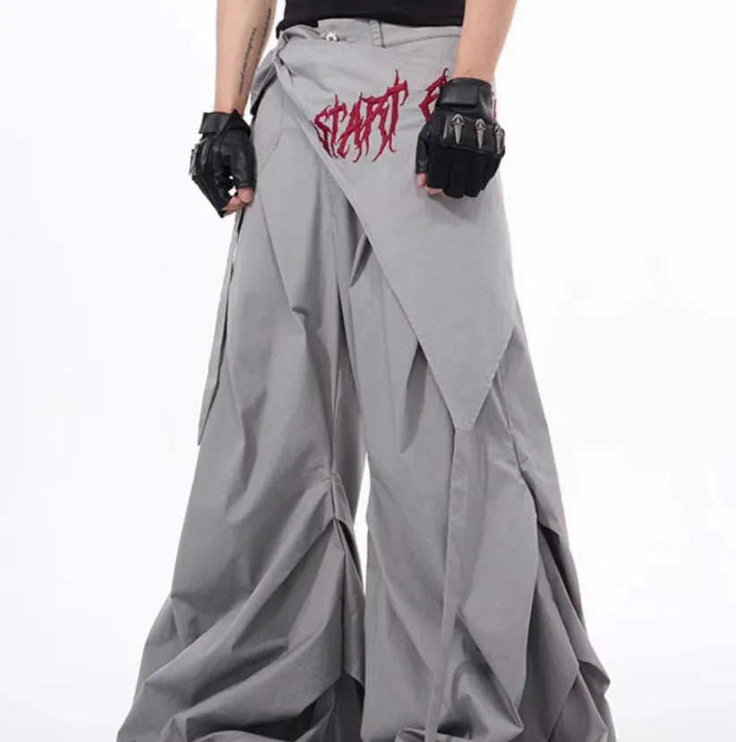 Boys wide-leg Korean style trousers in black and grey colours showing summer functional design