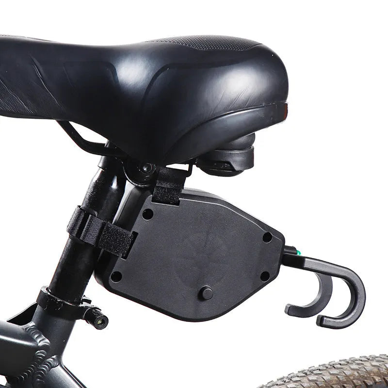 Black plastic bicycle trailer rope connecting mountain bike to child trailer