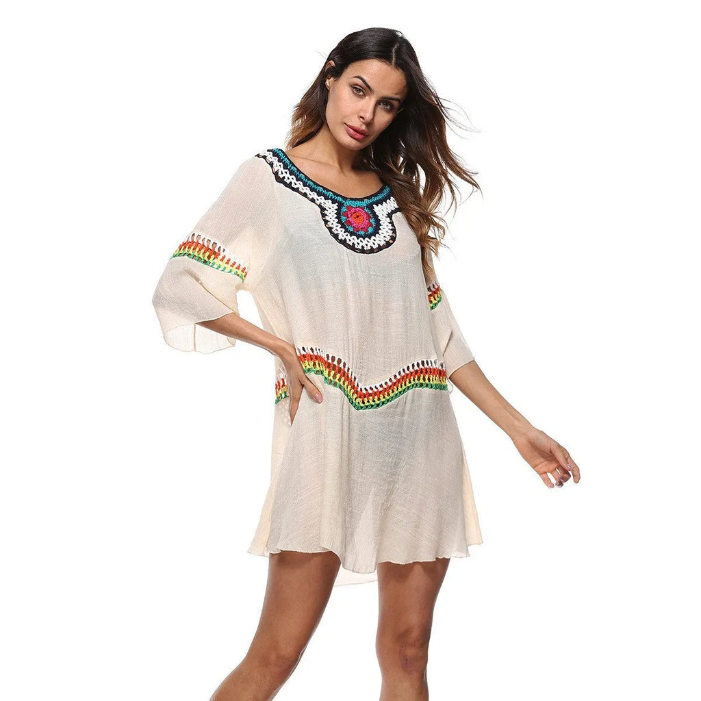 Crocheted ethnic style women's beach cover-up in acrylic fabric for sun protection.
