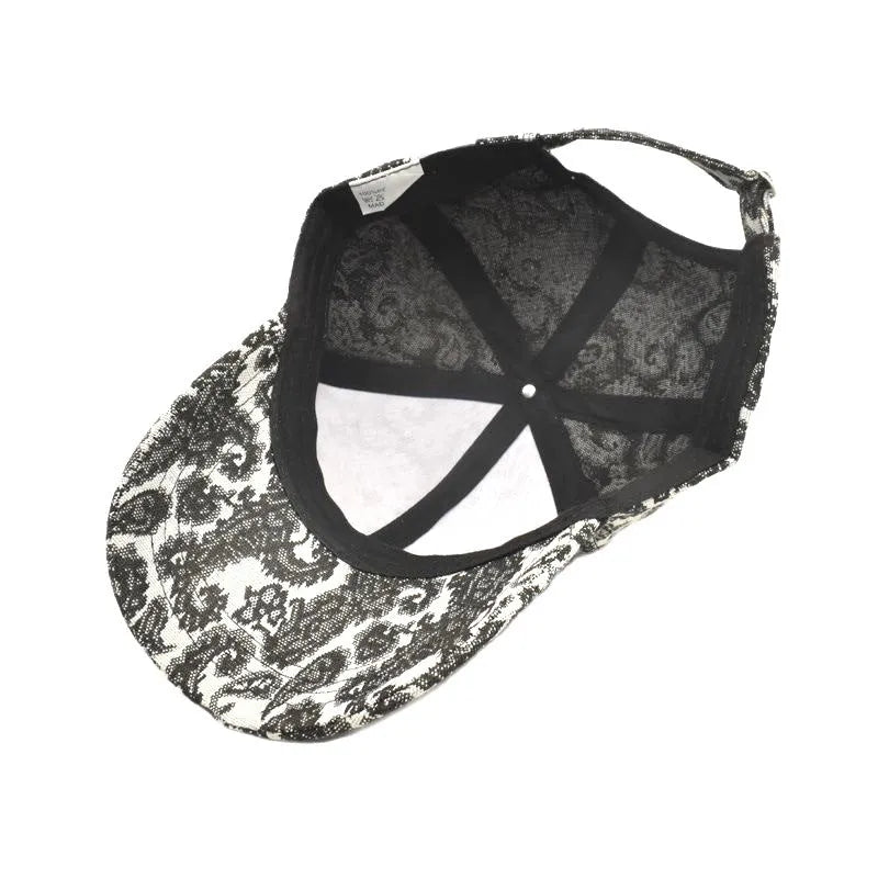 Baseball cap with paisley pattern print in blue colour showing dome crown design