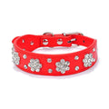 Black PU leather dog collar with diamond flower studs and a metal adjustable buckle.