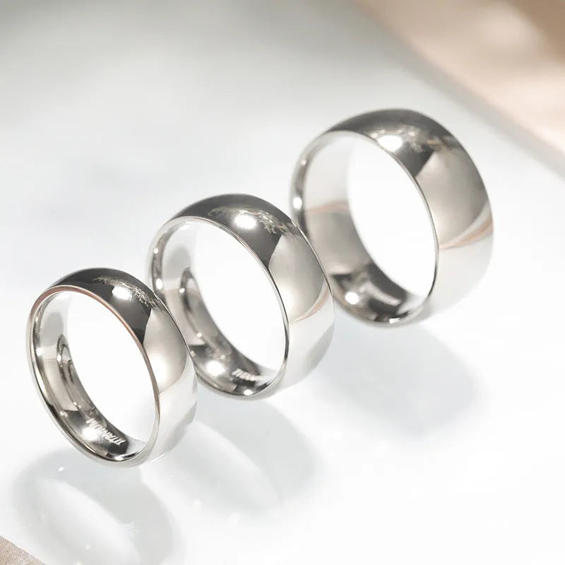 Titanium steel silver ring with grinding finish shown in three width options